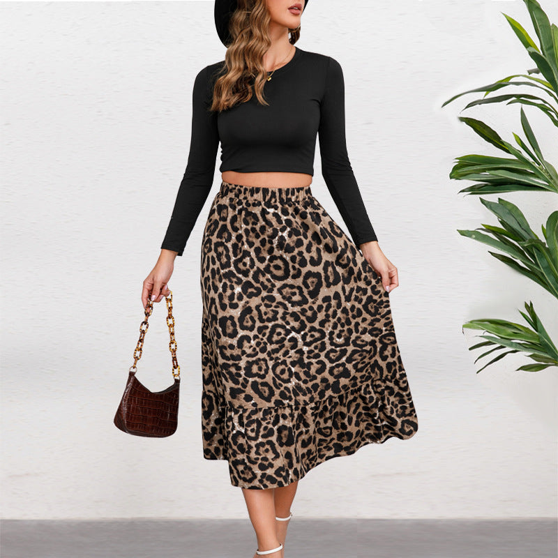 Women's midi skirt with elegant leopard print and flowing cut, size