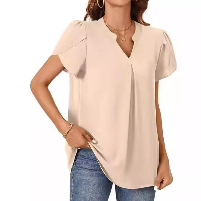 Damenbluse mit elegantem V-Ausschnitt-Detail und leichten Puffärmeln, Größe [size]