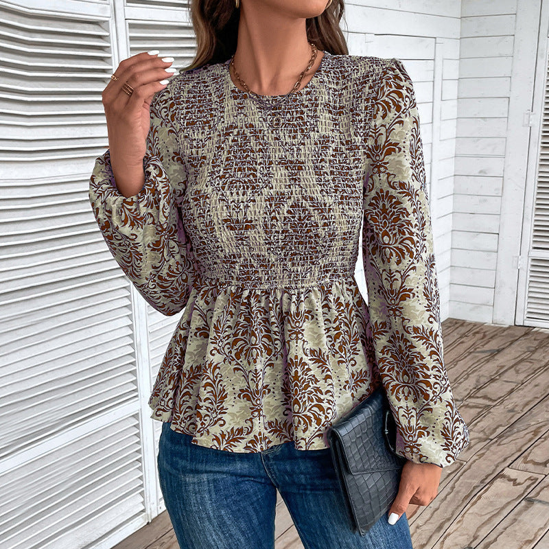 Women's blouse with elegant ruffle seams and floral pattern, size S