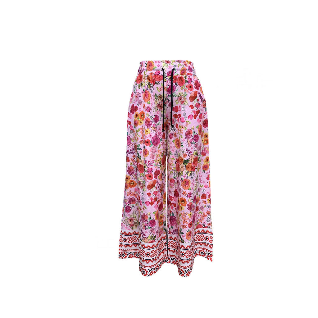 Damenhose mit weitem Bein, Blumenmuster, elastischem Bund und praktischen Taschen, Größe