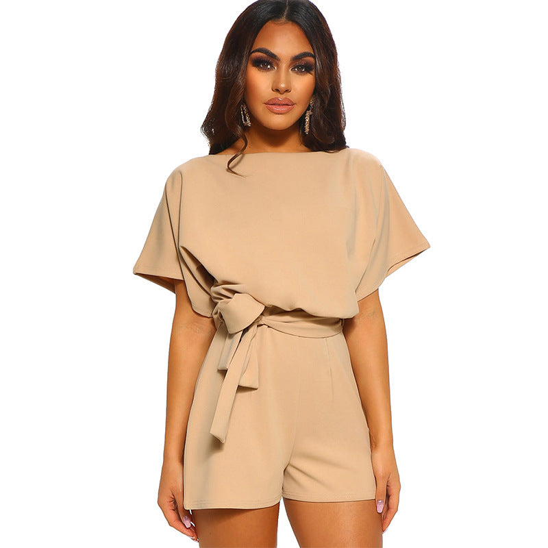 Women's one-piece jumpsuit with a relaxed fit and tie belt, size [size missing]