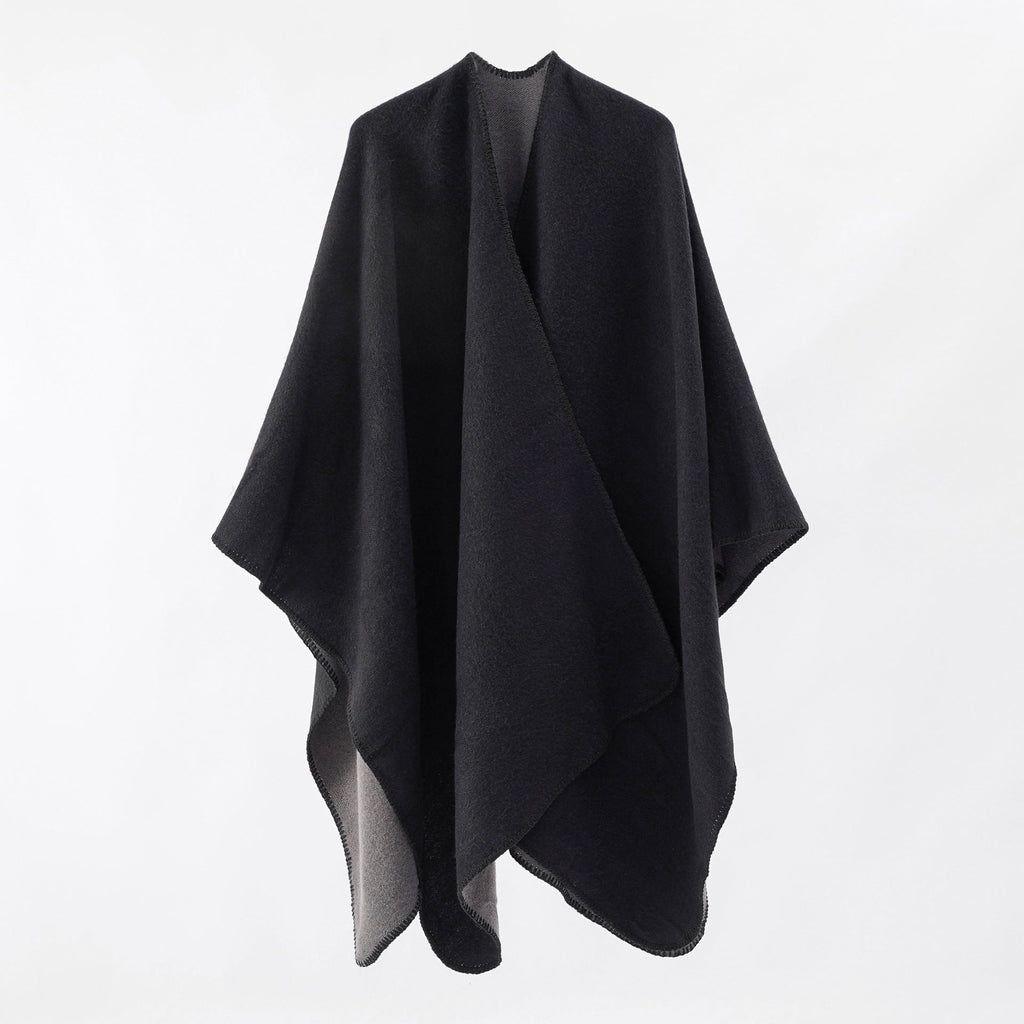 Women's knitted poncho with asymmetrical cut and high warmth retention, size