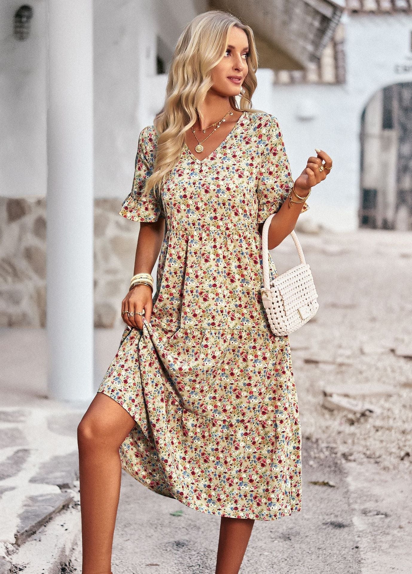 Women's midi dress with floral pattern and playful V-neck, size