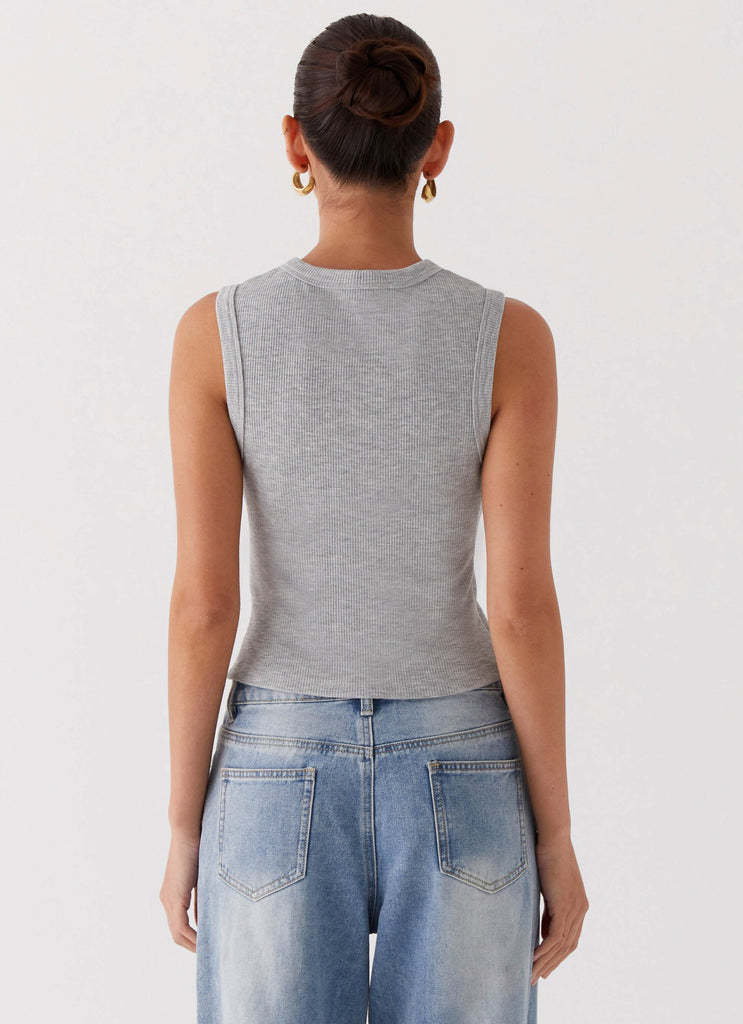 Valenzora | Sleeveless top with button placket