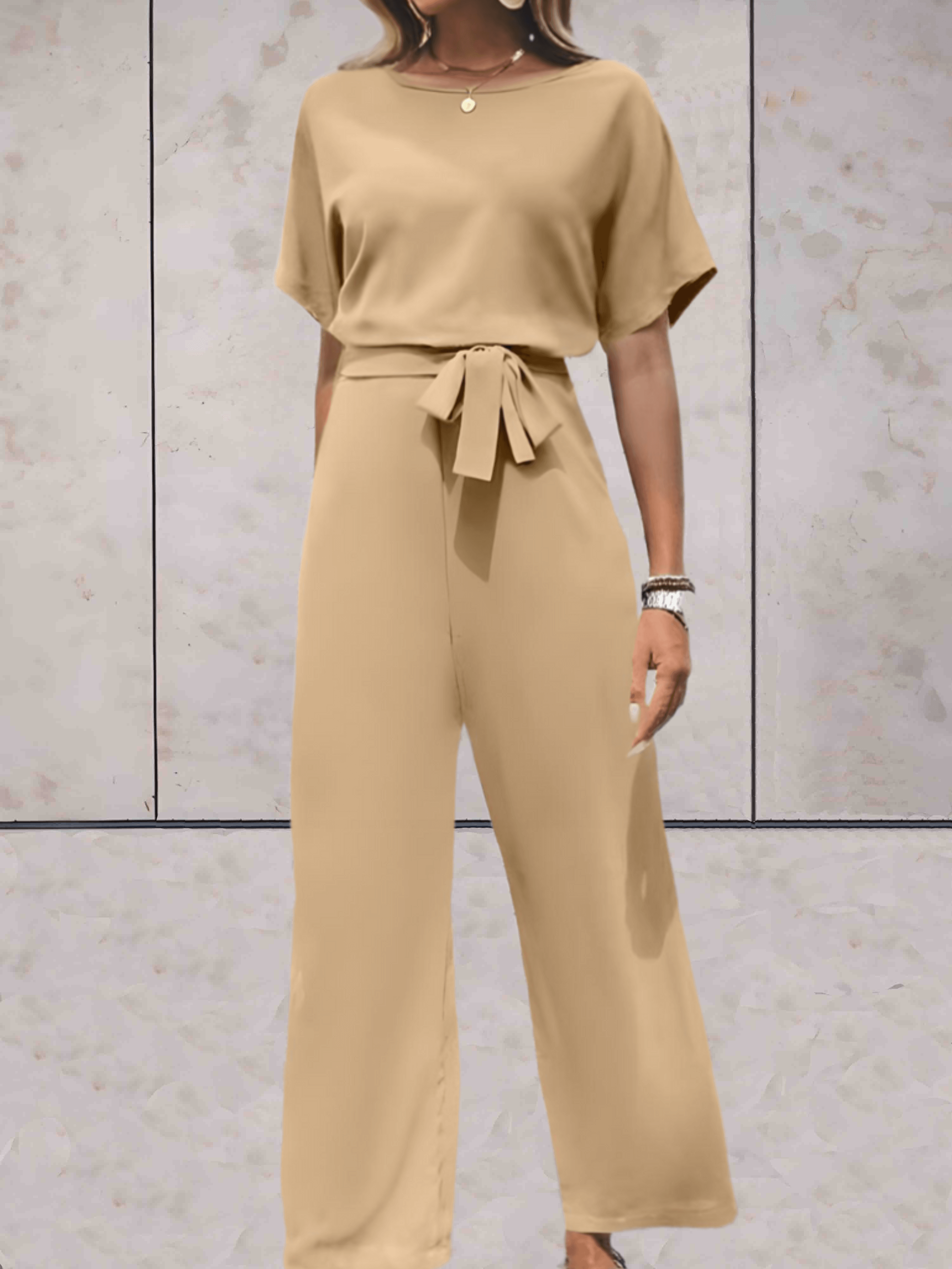 Valenzora - Jumpsuit with belt and short sleeves