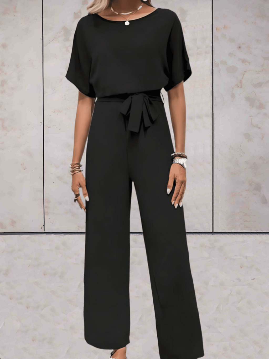 Valenzora - Jumpsuit with belt and short sleeves