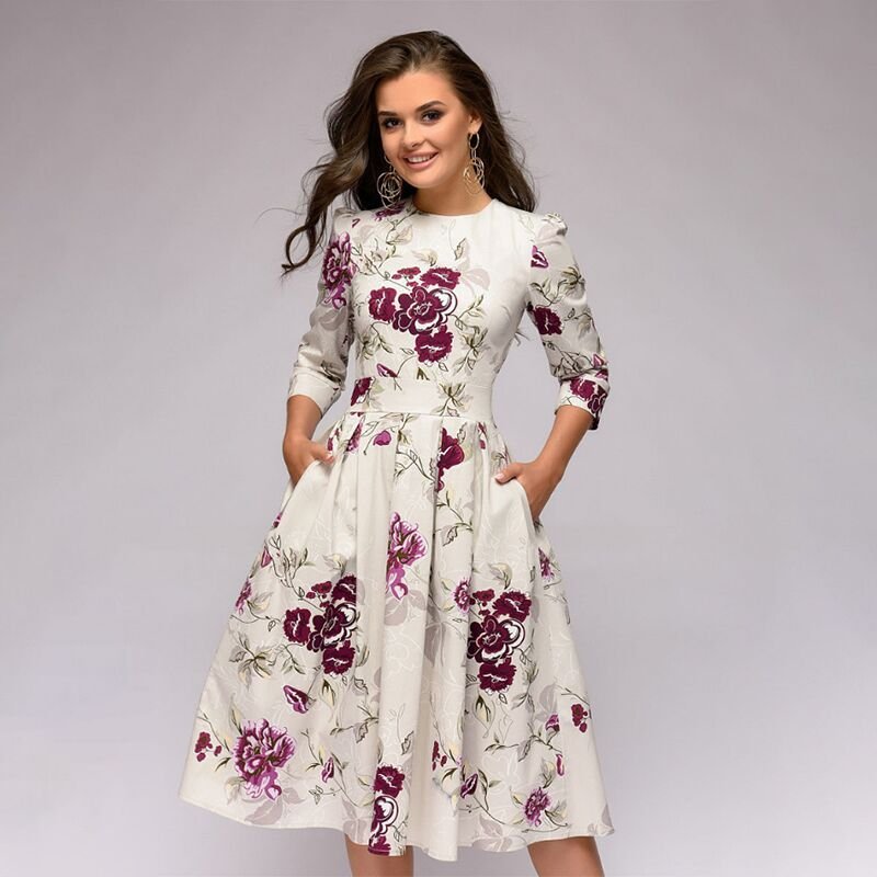 Valenzora | Lässiges Midikleid mit Rundhalsausschnitt, Blumenmuster und Taschen