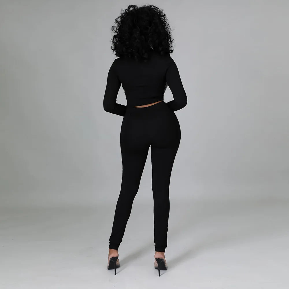 Valenzora | Two-piece set with short faux leather corset and high-waisted trousers