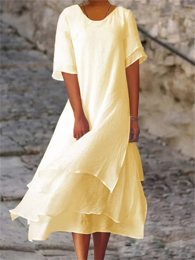 Valenzora | Double-layered slit short-sleeved dress with round neckline