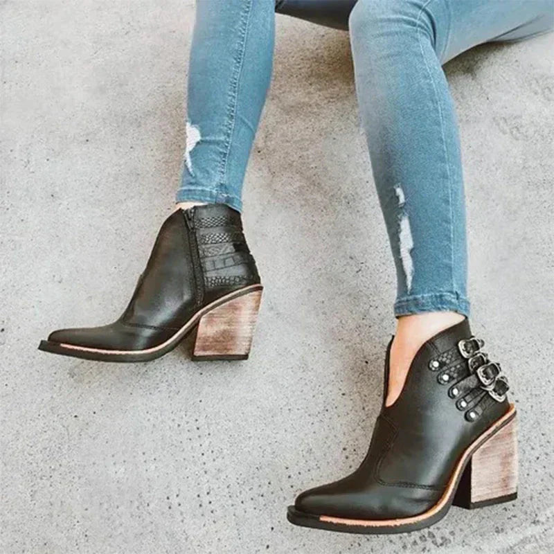 Boots with studs and a thick buckle