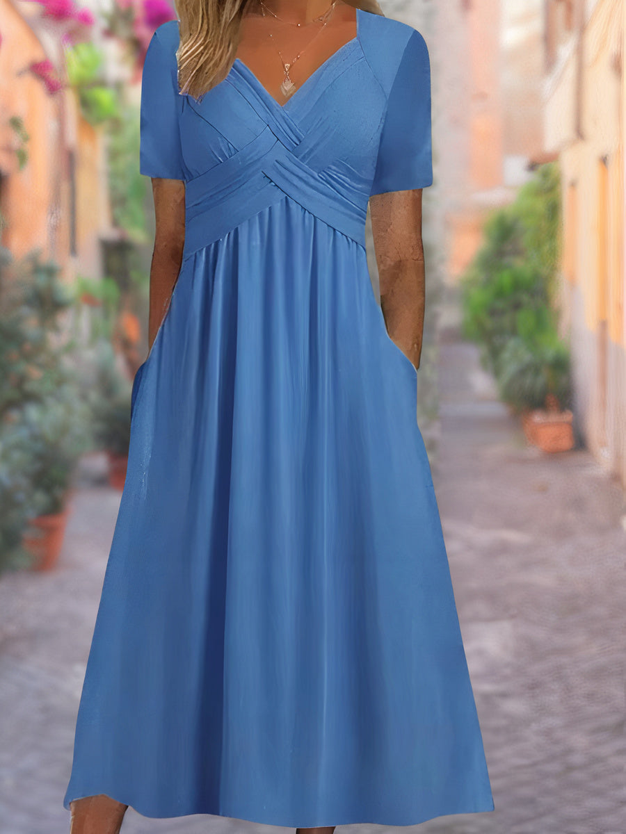 Valenzora | Midi dress with side pockets