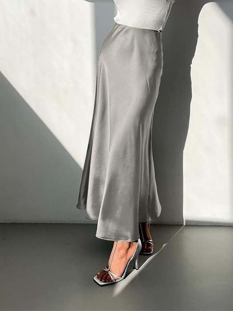 Valenzora | The elegant satin midi skirt