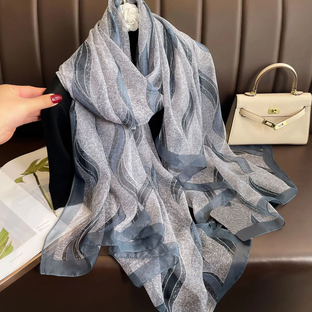 Valenzora | Silk scarf with elegant design and soft texture for cold days. Style