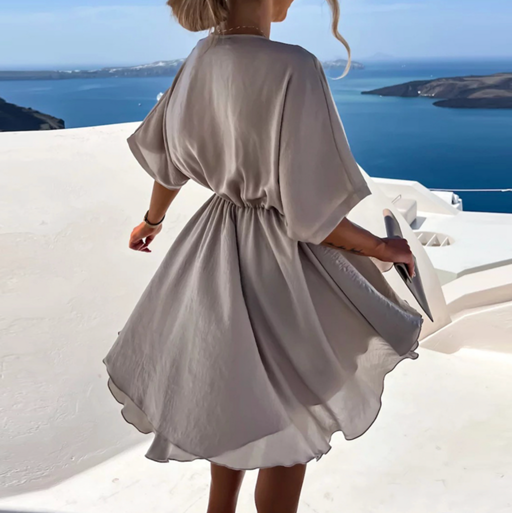 Valenzora | Graceful dress with delicate pleats