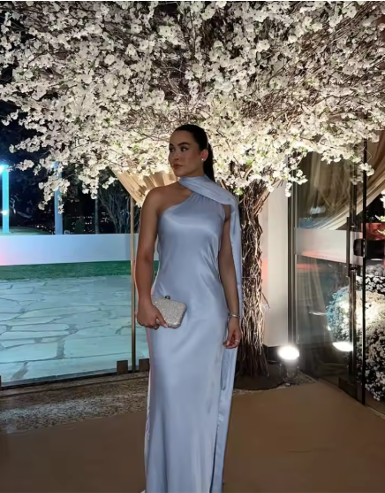 Women's elegant evening dress with asymmetrical design and soft cape, size S
