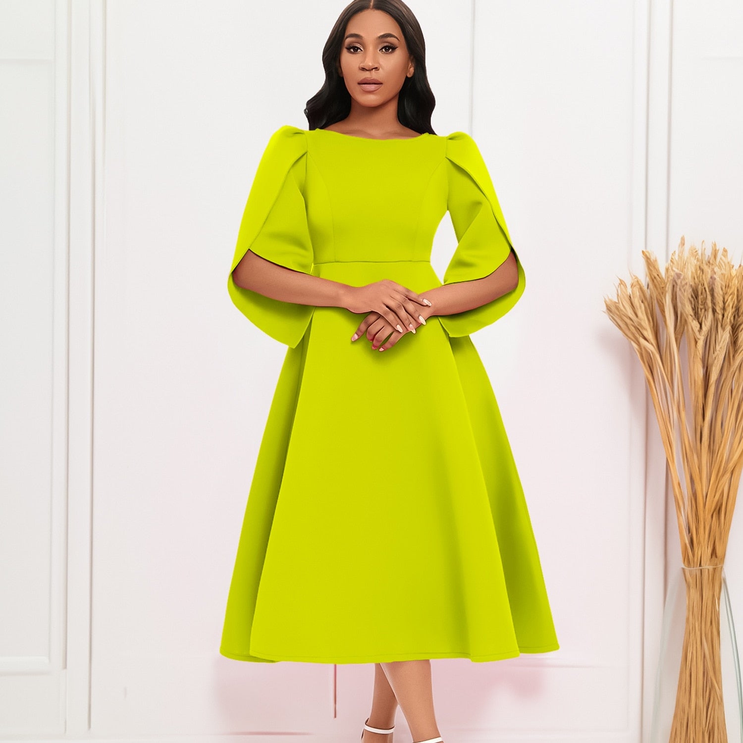 Valenzora - Elegant green ruffled dress