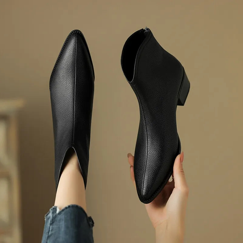 pointed leather boots