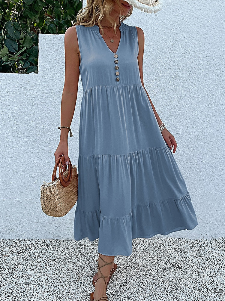 Valenzora | Midi dress Stay comfortable with our loose midi dress, perfect for any occasion