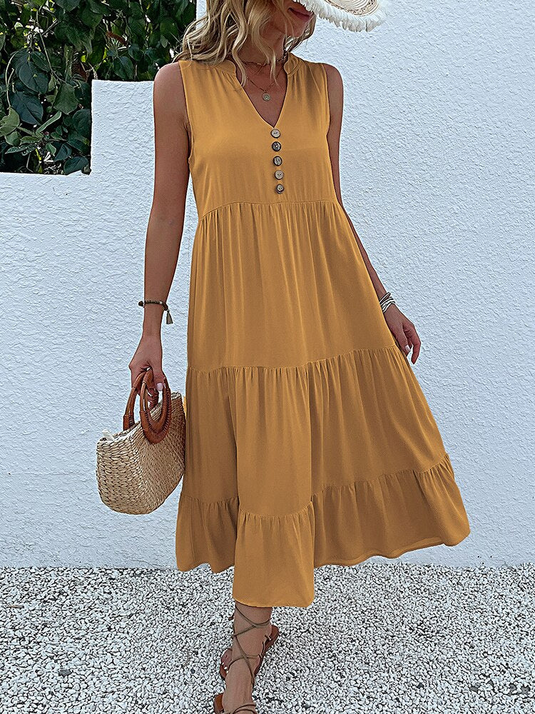 Valenzora | Midi dress Stay comfortable with our loose midi dress, perfect for any occasion