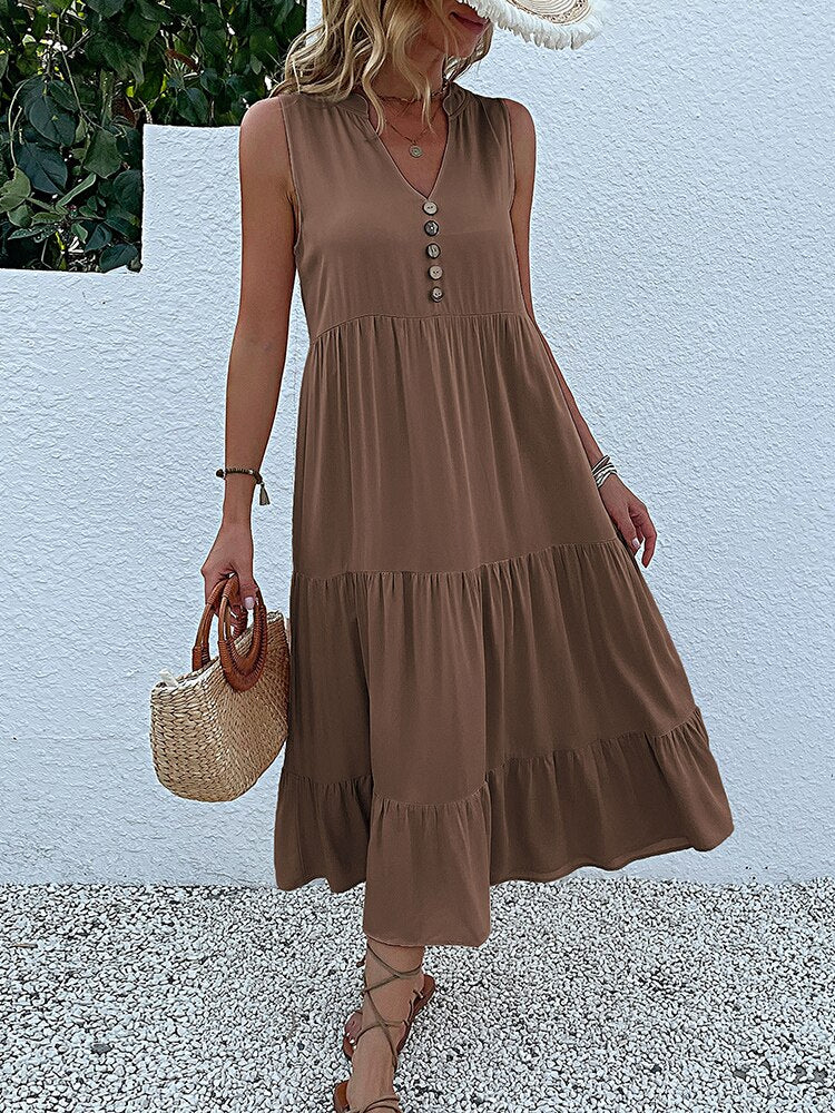 Valenzora | Midi dress Stay comfortable with our loose midi dress, perfect for any occasion