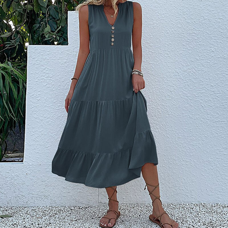 Valenzora | Midi dress Stay comfortable with our loose midi dress, perfect for any occasion