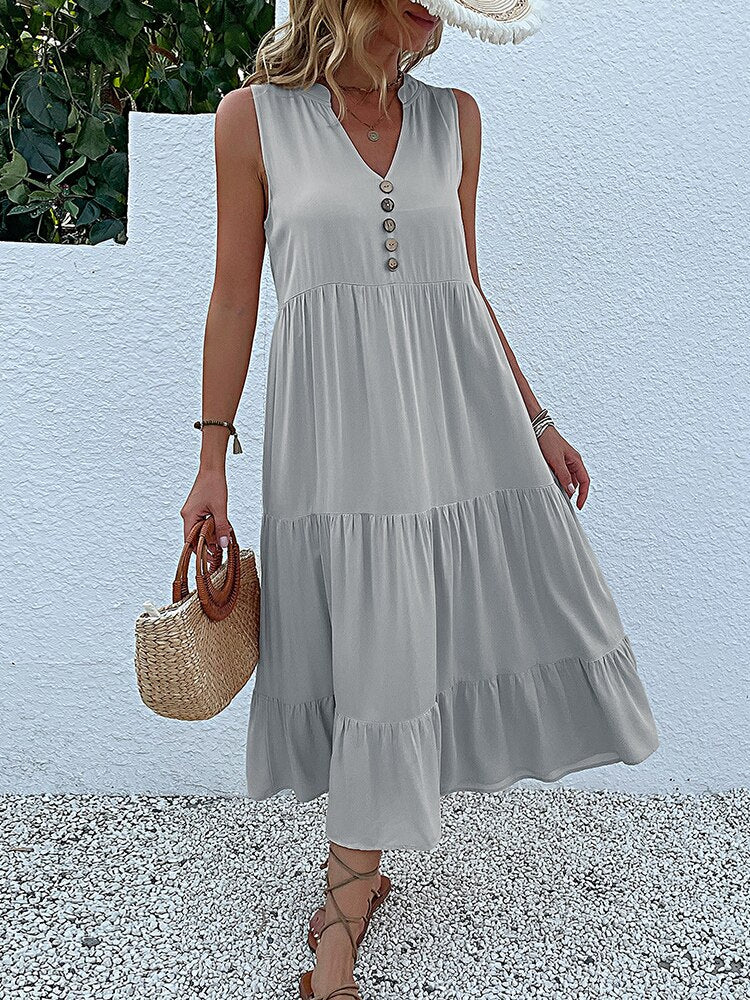 Valenzora | Midi dress Stay comfortable with our loose midi dress, perfect for any occasion