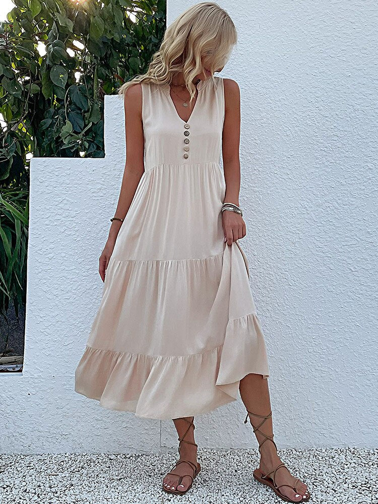 Valenzora | Midi dress Stay comfortable with our loose midi dress, perfect for any occasion