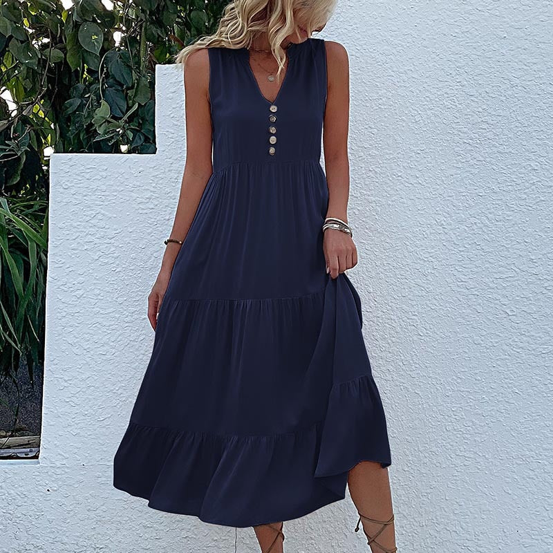 Valenzora | Midi dress Stay comfortable with our loose midi dress, perfect for any occasion