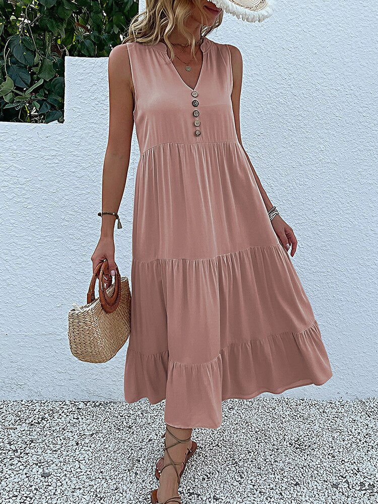 Valenzora | Midi dress Stay comfortable with our loose midi dress, perfect for any occasion