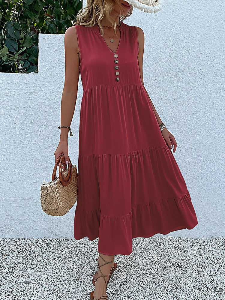 Valenzora | Midi dress Stay comfortable with our loose midi dress, perfect for any occasion