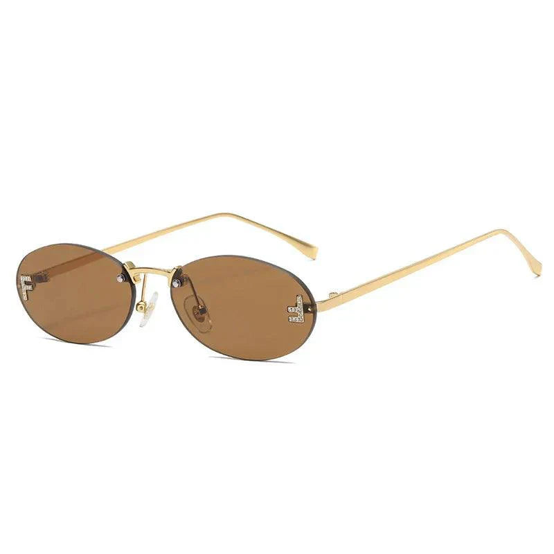 Valenzora | Ovale Sonnenbrille mit goldenen Akzenten und dezenten Steinen