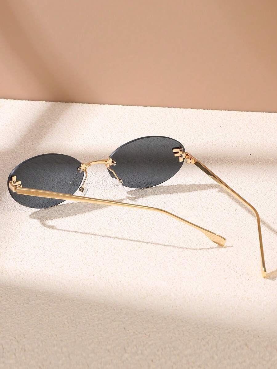 Valenzora | Ovale Sonnenbrille mit goldenen Akzenten und dezenten Steinen