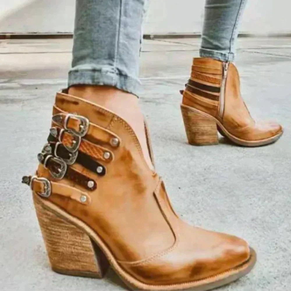 Boots with studs and a thick buckle