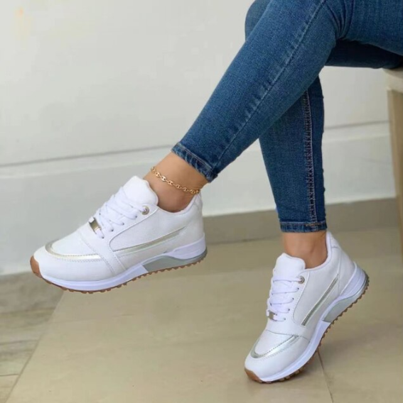 Valenzora | Stylish black sneakers with metallic accents for women