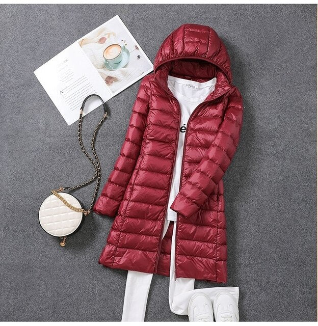 Ultraleichte, packbare, lange Pufferjacke