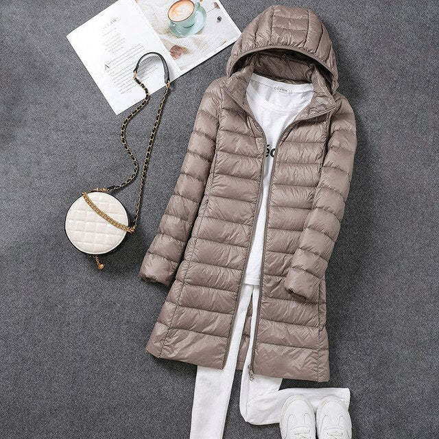 Ultraleichte, packbare, lange Pufferjacke
