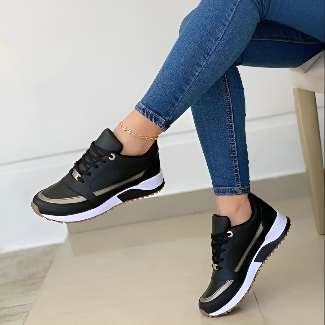 Valenzora | Stylish black sneakers with metallic accents for women