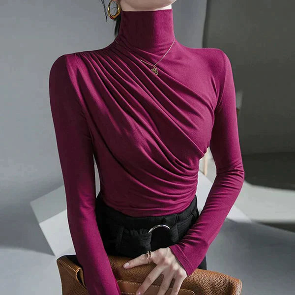 Roll-neck sweater with pleats