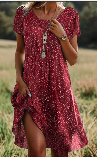 Valenzora | Short-sleeved green mini dress with polka dots