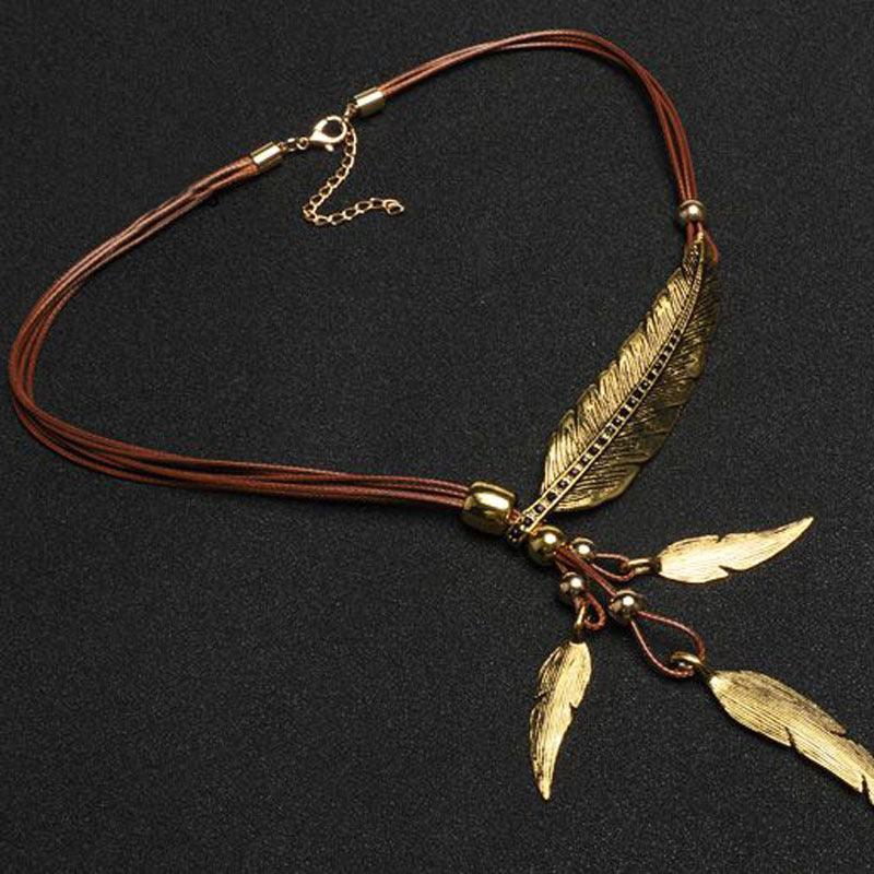 Valenzora | Golden Feather Necklace in Boho Style