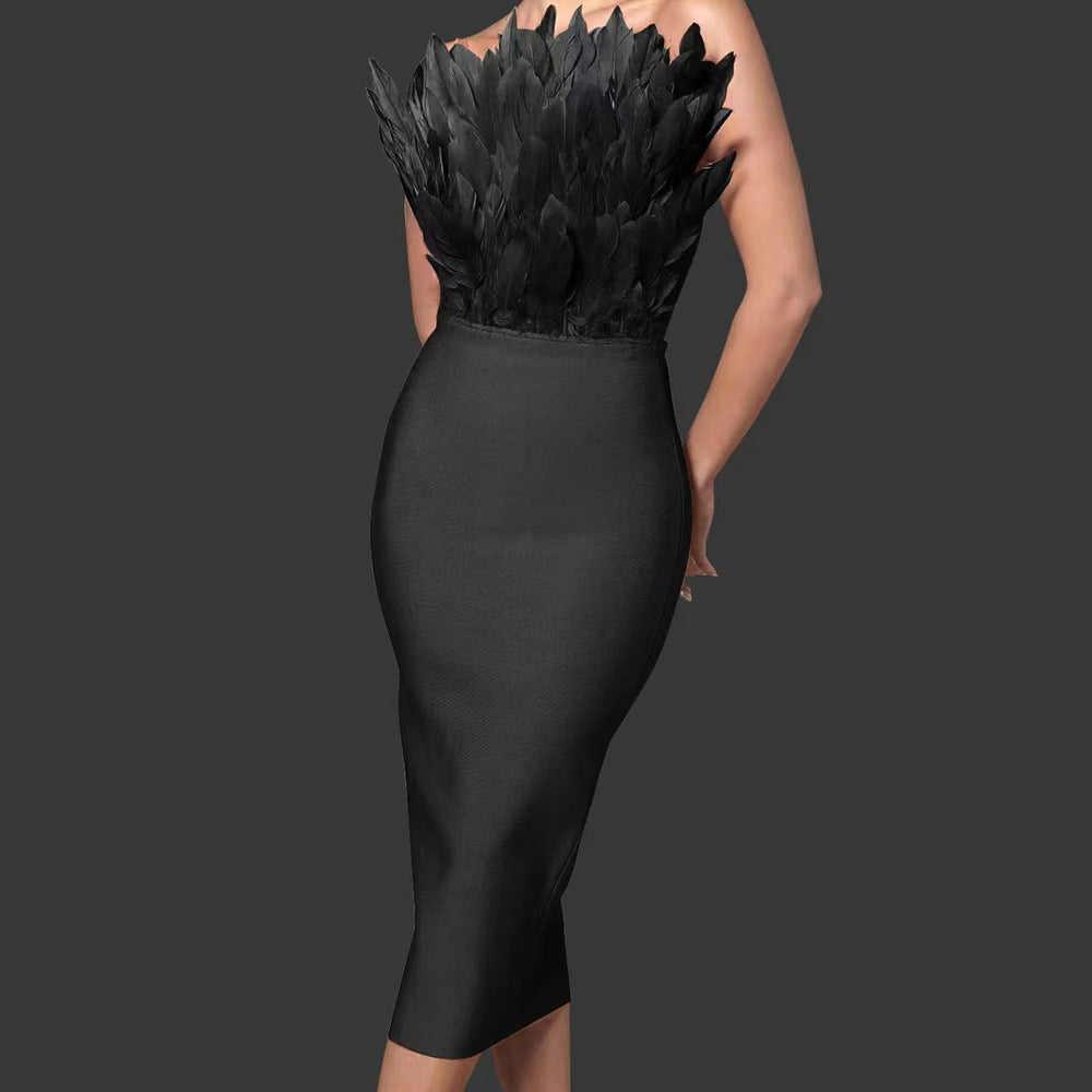Valenzora women's dress with waist accentuation and feather embellishment