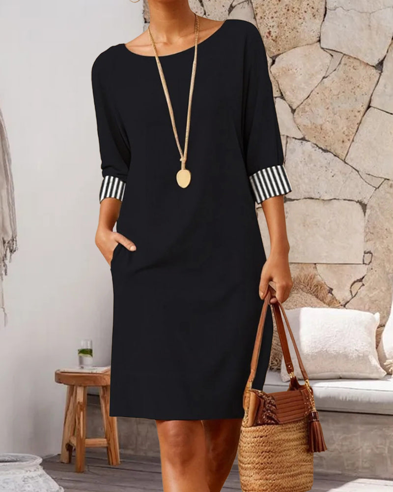 Valenzora | Elegant dress with a round neckline and striped cuffs