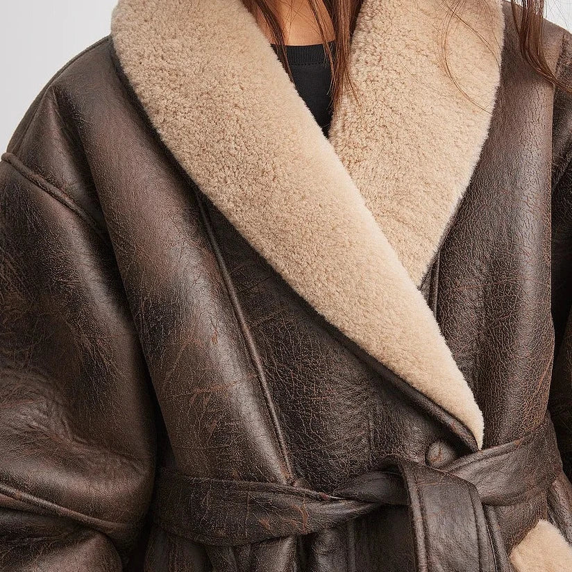 Valenzora | Sherpa-lined faux leather jacket with belt
