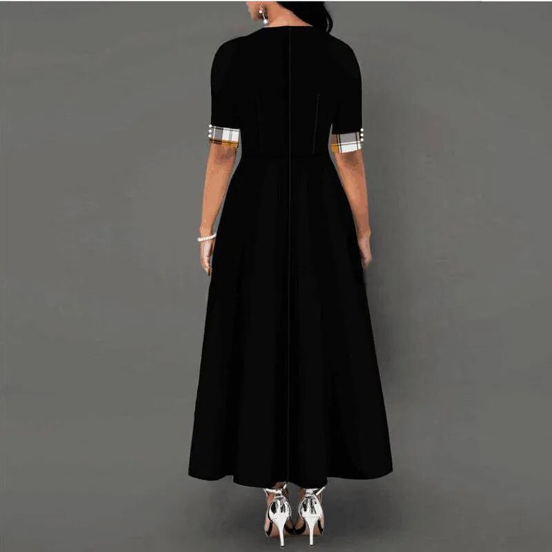 Valenzora - Checkered dress with half sleeves