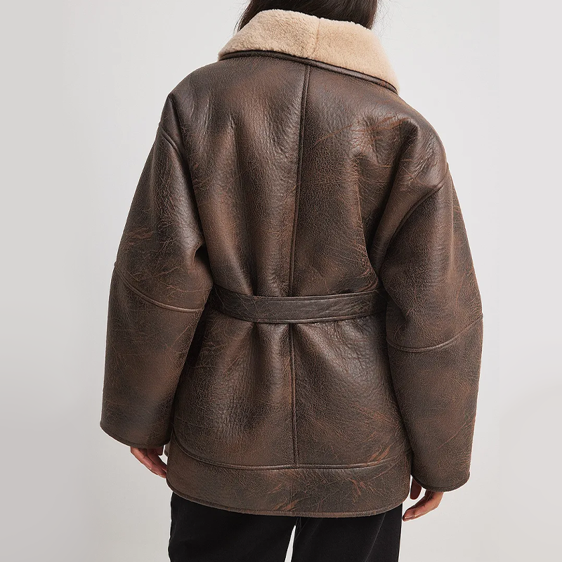 Valenzora | Sherpa-lined faux leather jacket with belt