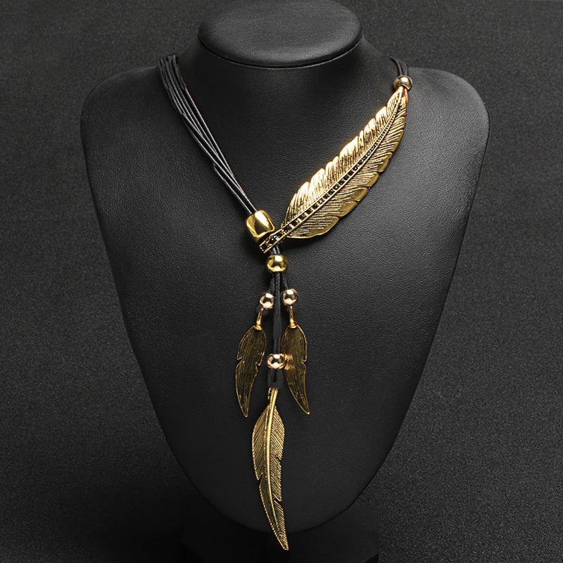 Valenzora | Golden Feather Necklace in Boho Style