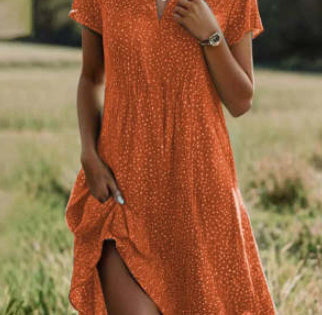 Valenzora | Short-sleeved green mini dress with polka dots
