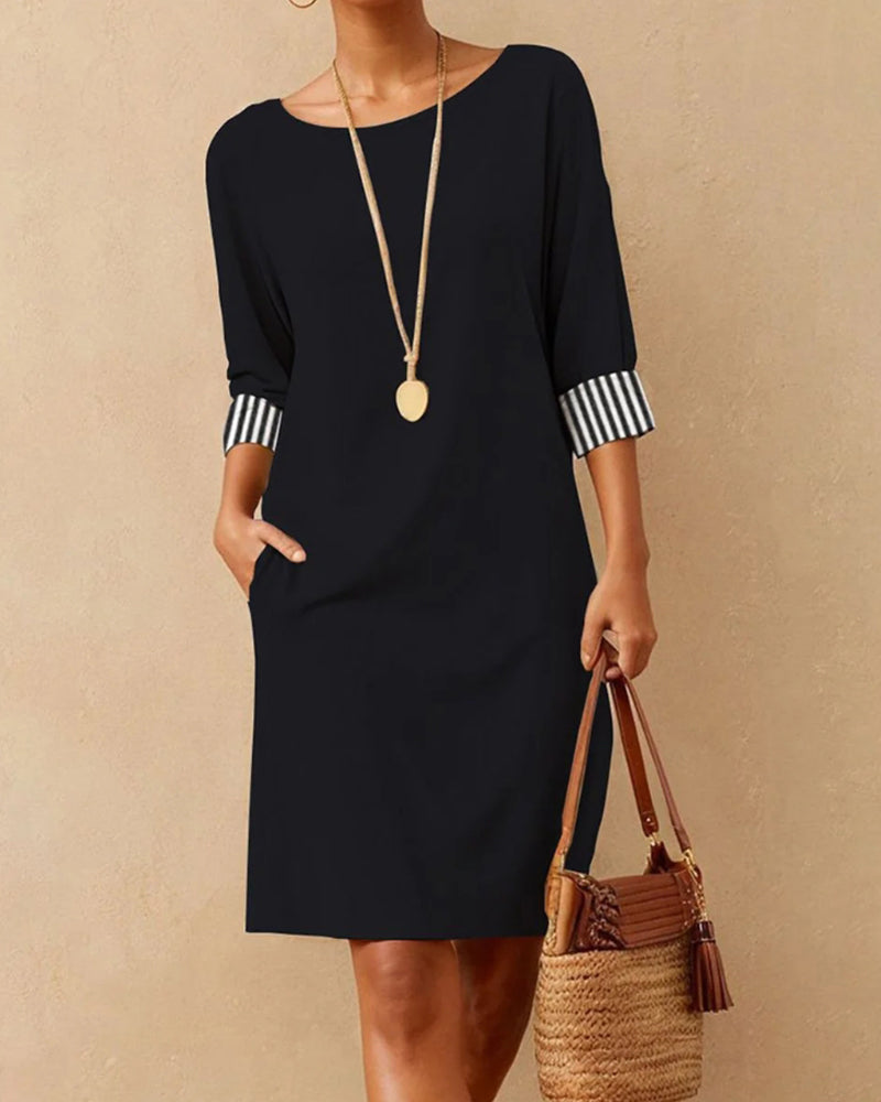 Valenzora | Elegant dress with a round neckline and striped cuffs