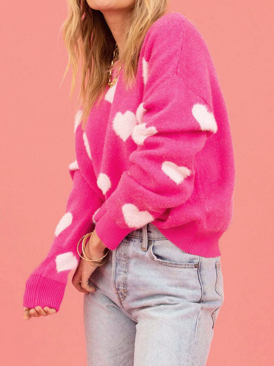 – Knitted sweater with heart print