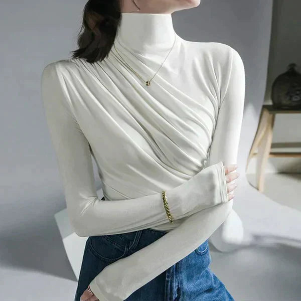 Roll-neck sweater with pleats